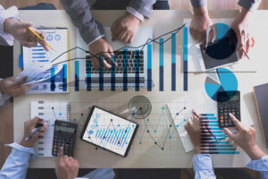 data chart overlay on business team working